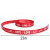 WSTĄŻKA SATYNOWA Z NADRUKIEM LOVE 12mm x 23m