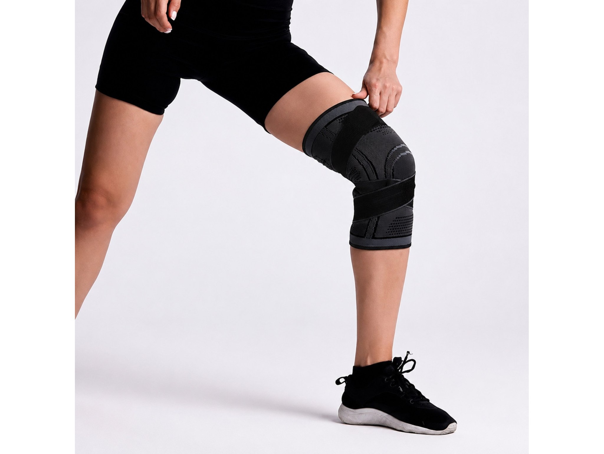 OPASKA STABILIZATOR ŚCIĄGACZ SPORTOWY NA KOLANO - rozmiar L
